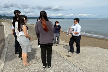 寒中みそぎ祭りで行修者を4年間務められた職員さんの身振りを交えた解説