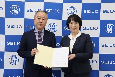 右:佐野学校長、左:増川学部長